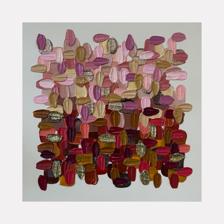 Ruby Haze by Shiri Phillips presents a rich, layered assemblage of thick, textured brushstrokes in warm pinks, reds, golds, and earthy browns. The bold, overlapping shapes create a tactile, dynamic composition that evokes a sense of warmth and depth, blending contemporary abstraction with a vibrant, handcrafted energy.