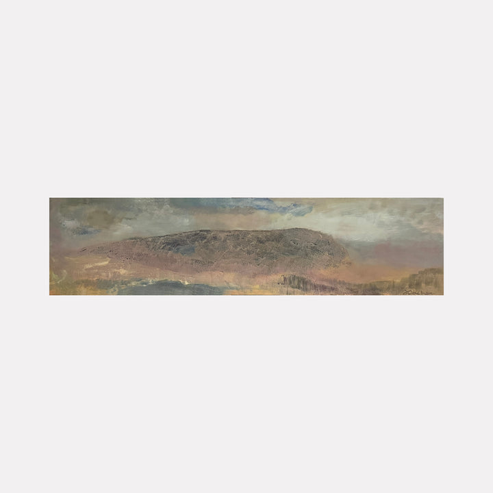 SLEEPING BUFFALO by Diane Love depicts a broad, rounded natural formation rendered with subtle earth tones and soft textures. The muted layers of warm browns and grays blend gently into an overcast sky, evoking a peaceful, contemplative mood that honors the quiet endurance of the natural world.