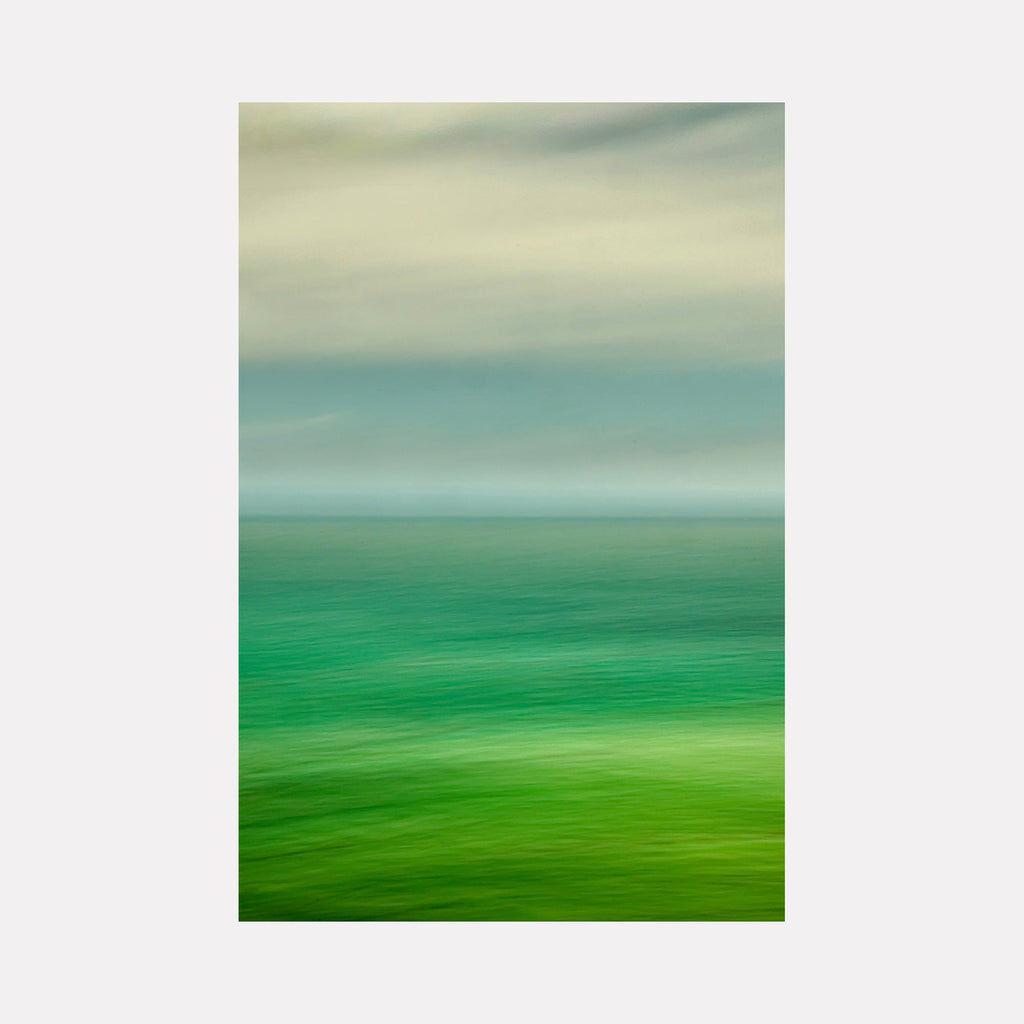 The artwork "South Pacific" by Neil Shapiro features a serene abstract seascape with horizontal layers of soft greens and blues blending into muted grays and beige skies. The smooth, flowing textures evoke a minimalistic, atmospheric style reminiscent of Mark Rothko’s color field paintings, capturing calm and depth in an ethereal composition.