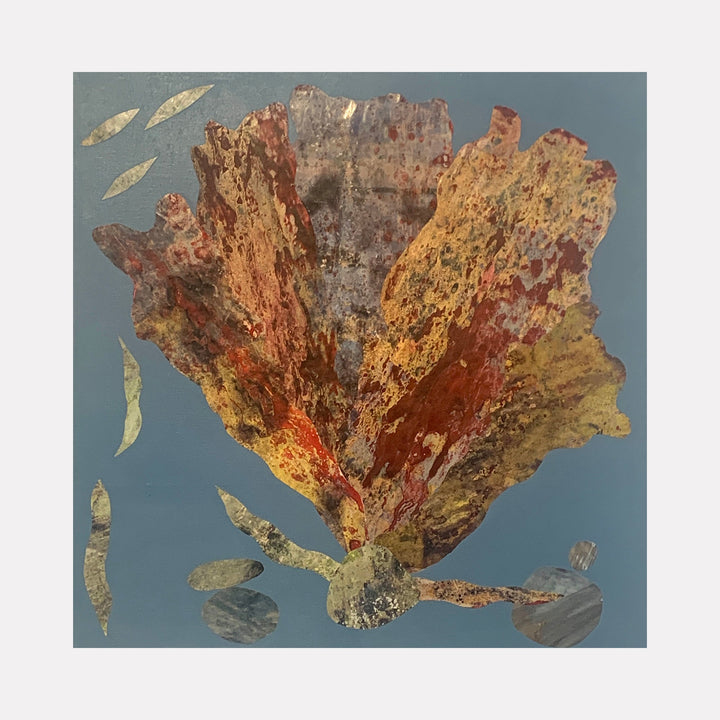 The artwork 'Sea Fan 7' by Sunny Chapman features an abstract marine composition with a vibrant coral-like form in rustic oranges, golds, and deep reds against a serene blue-grey background. The textured collage includes alchemic prints creating a weathered, organic effect, resembling a preserved sea fan coral mounted on wood panel.