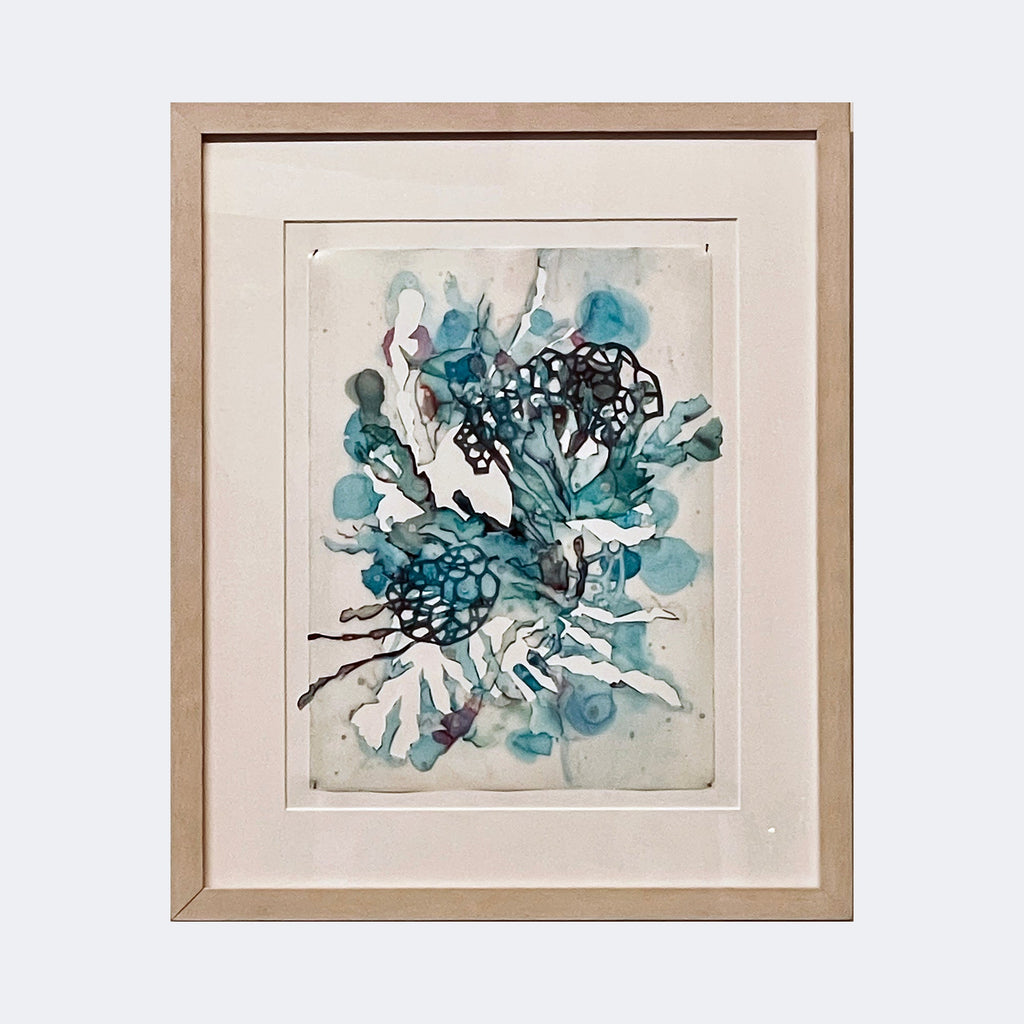 The artwork "Beauty of Chaos #9" by Sonomi Kobayashi features an abstract composition with fluid organic shapes in shades of teal, blue, and black. The piece showcases translucent watercolor textures blending with intricate dark web-like patterns, evoking a style reminiscent of Helen Frankenthaler’s color field works and Joan Miró’s biomorphic forms, framed in light wood.