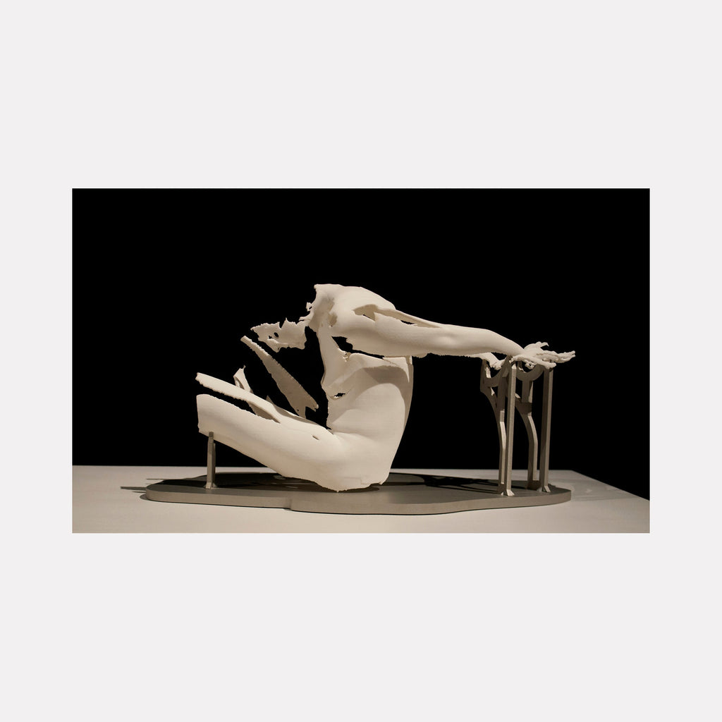The artwork "Periode De Clownisme 2" by Sophie Kahn features a fragmented white human figure reclining with arms extended, supported by minimalist metallic structures. The textured, hollowed forms evoke a sense of vulnerability and motion, reminiscent of contemporary sculptural works by Antony Gormley and the deconstructed anatomy aesthetics of Louise Bourgeois.