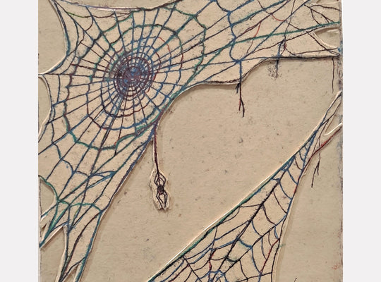The artwork 'Spiderweb' by Johanna Ryan features an intricate blue-tinted spider web pattern on beige paper. The monotype print showcases delicate spiral lines radiating from a central point, with thin intersecting strands creating a geometric network. A small spider detail hangs from one of the web strands, adding depth to this 8x8 inch trace monotype composition.
