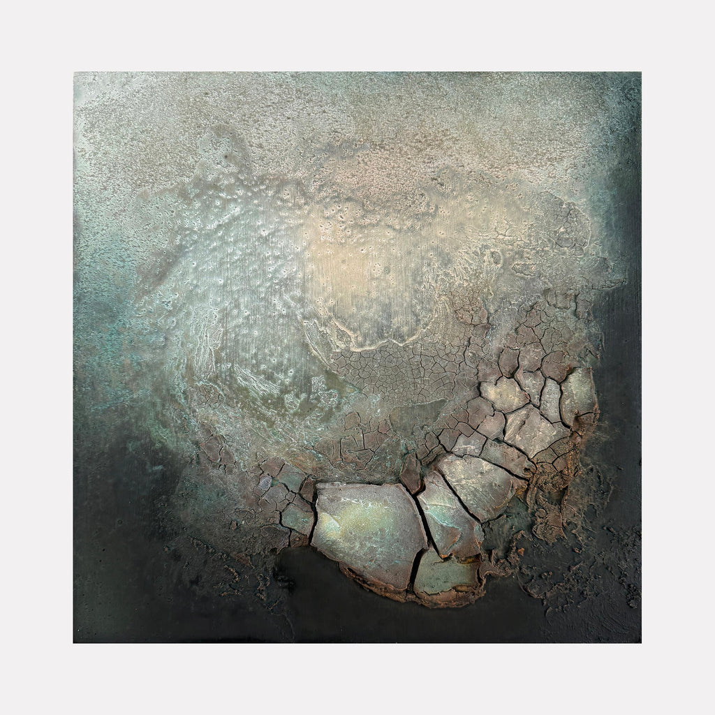 The artwork "Blue Gyre" by Abbey Stace features a textured, abstract composition dominated by cool blue and buff white tones, with cracked, organic shapes that evoke weathered stone or dried earth. Its layered surface and atmospheric depth recall the tactile abstraction of Anselm Kiefer and the natural, textural interplay found in the works of Jean Dubuffet.