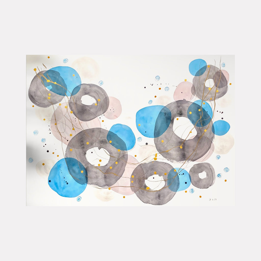 Subconscious Inclination by Jocelyn Benford features overlapping circular forms in turquoise blue and smoky gray watercolor, creating a dreamy abstract composition. Gold accents and delicate splatters dance across the white paper, while translucent layers create depth and ethereal movement through the mixed media artwork.