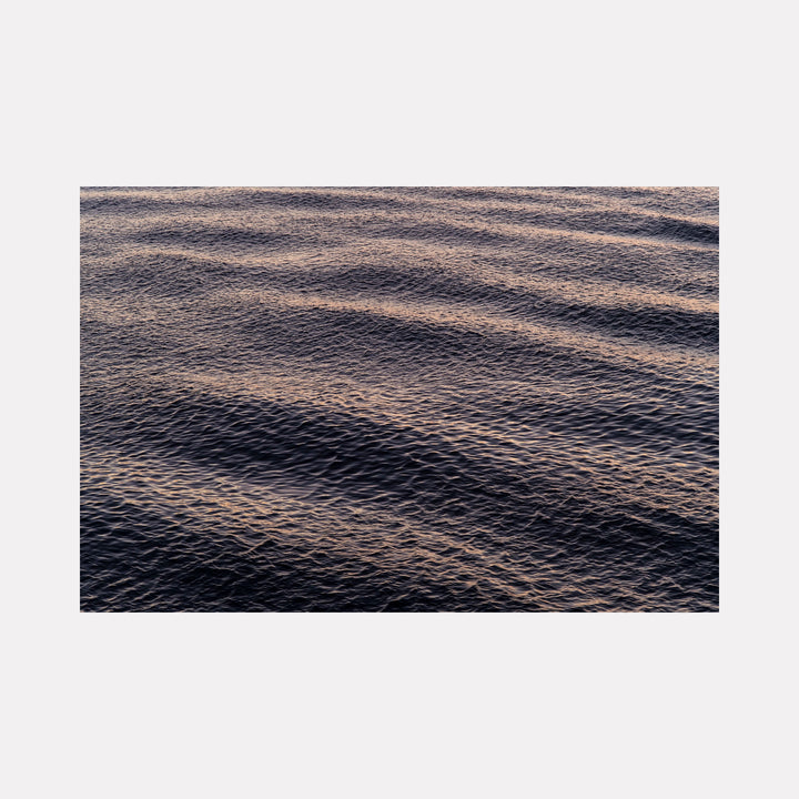 Surface Tensions 01 by Steve Edson captures the delicate ripple patterns of water under soft, subdued lighting, emphasizing subtle textures and natural undulations that evoke a sense of calm and contemplative rhythm in a minimalist, atmospheric seascape.