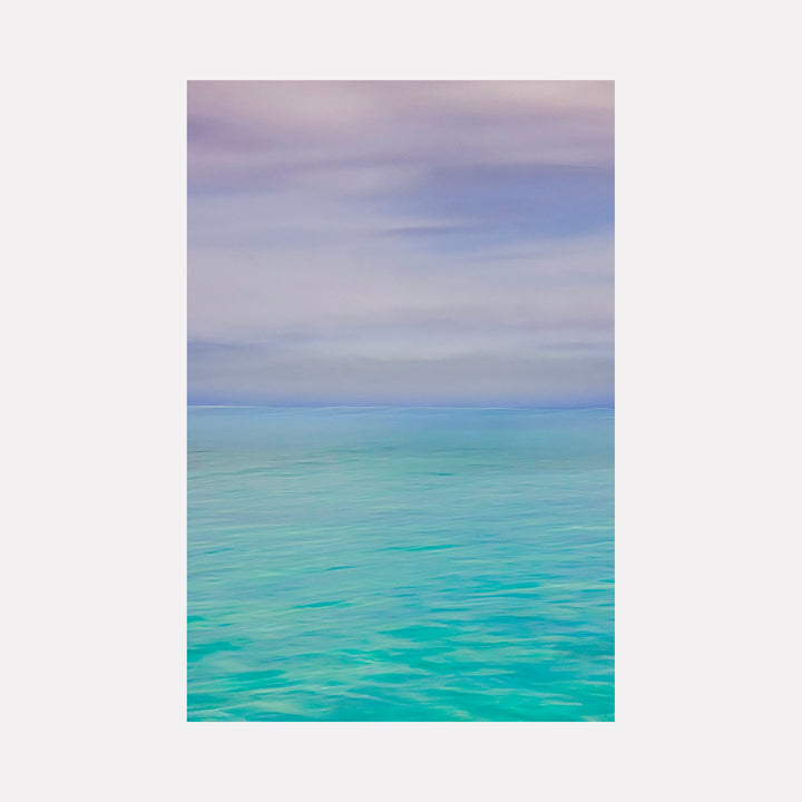 The artwork "Tahiti" by Neil Shapiro features a serene seascape with smooth gradients of turquoise and aqua merging into soft lavender and pale blue skies. The composition emphasizes calmness and vastness with subtle blending reminiscent of Monet’s impressionistic water scenes and the tranquil minimalism found in works by Hiroshi Sugimoto.
