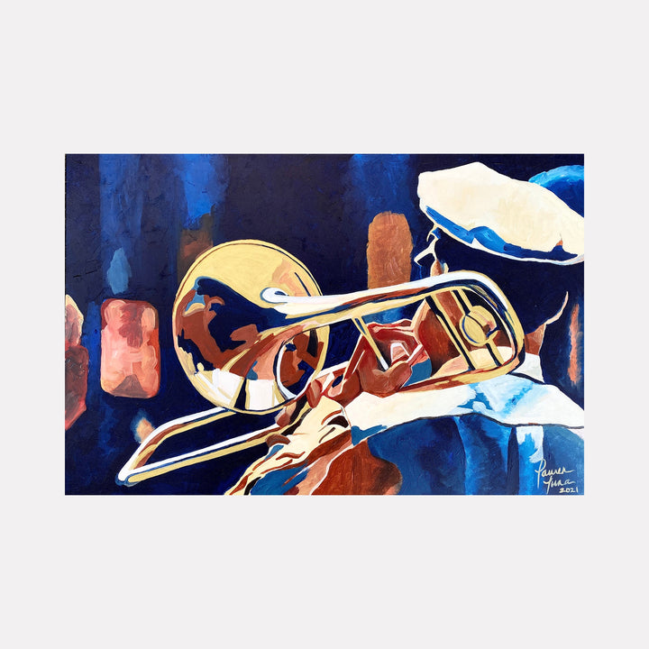 The artwork "That Jazz Man" by Lauren Luna depicts a close-up of a musician playing a shiny trombone, with rich gold and bronze tones contrasted against deep blues and warm brown background. The textured brushstrokes highlight the reflective brass instrument and the musician’s white hat and blue clothing, evoking a vibrant jazz scene. Lauren Luna.