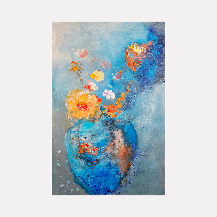 The World Became a Vase by Janyce Erlich-Moss is a Curina art piece featuring an abstract blue vase with vibrant orange and yellow flowers seemingly dissolving into a textured sky-blue background, blending fluid forms and delicate bursts of color in a dreamlike composition.