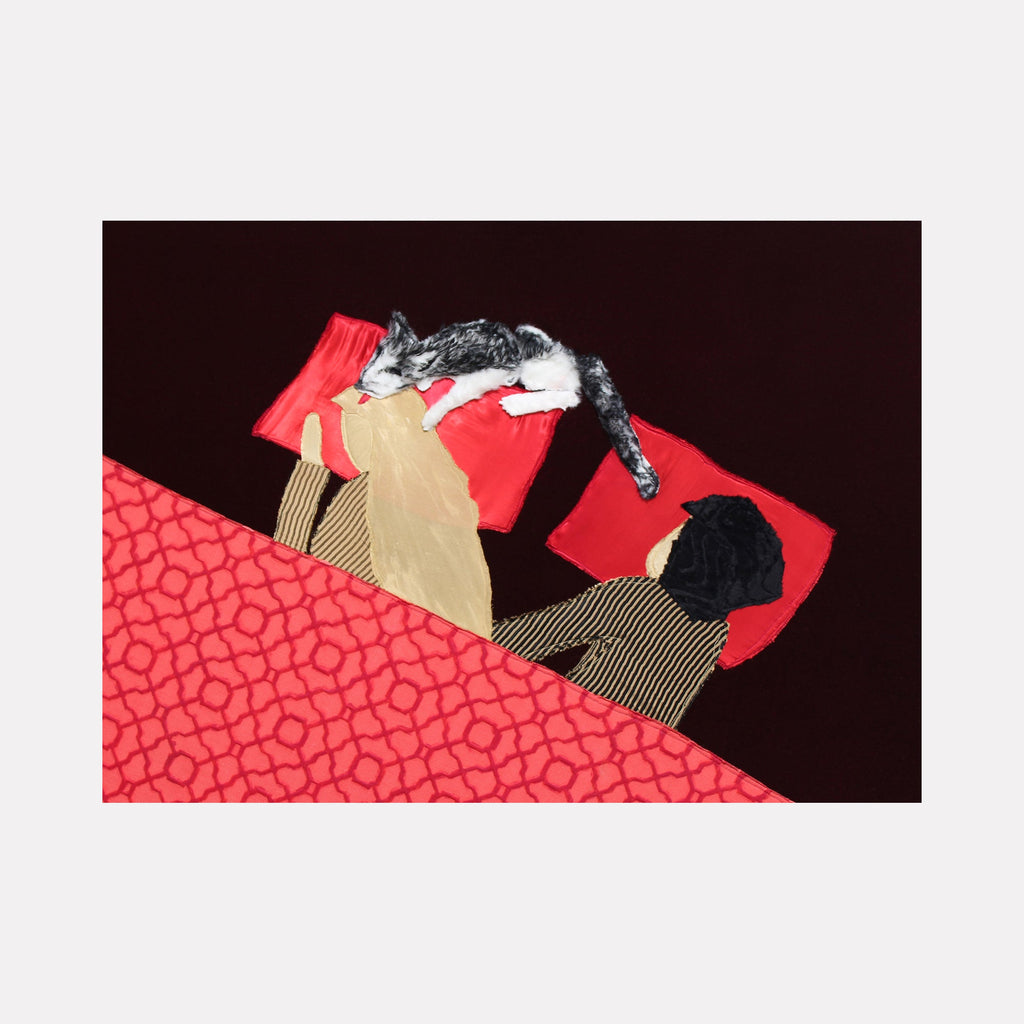 The artwork 'The Claws Come Out at Night' by Ali Ha features a striking collage composition with vibrant red fabric background adorned with geometric patterns. The piece combines tan and striped textiles in applique technique, creating abstract forms against a textured surface. Black and white accents add dramatic contrast, showcasing the tactile, mixed-media approach. By Ali Ha.