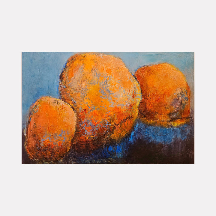 The artwork "Trio" by Janyce Erlich-Moss features three large, textured, rounded orange forms set against a deep blue and black background. The painting showcases rich brushstrokes with a blend of warm and cool tones, emphasizing an abstract, organic composition that highlights contrast and depth.