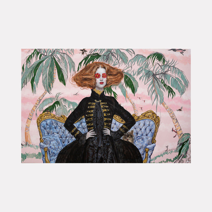 The artwork "Tropical Feeling" by Carlos Gamez de Francisco depicts a regal figure with voluminous red hair and red floral eyes, dressed in an ornate black outfit, seated on an elegant blue and gold antique sofa. The surreal scene is set against a backdrop of lush palm trees under a soft pink sky, blending refined portraiture with tropical fantasy.