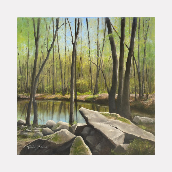 The artwork "Vernal Pool" by Carla Thomson depicts a serene woodland scene with tall, slender trees surrounding a tranquil pool of water. The soft greens and earthy browns evoke a peaceful, natural setting with detailed textures reminiscent of the serene landscapes by artists like Andrew Wyeth and the tonal subtlety seen in the works of the Hudson River School painters.