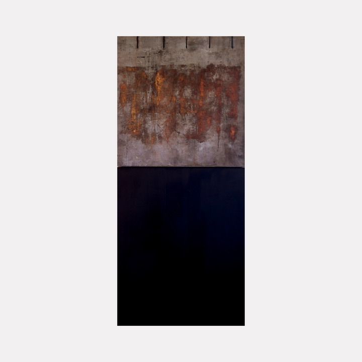 Vestige I by Diane Lounsberry-Williams captures a striking abstract contrast with a textured upper section featuring layers of rust, ochre, and muted gray tones above a deep, almost black expanse. The composition evokes a sense of weathered history and quiet depth, blending raw industrial elements with contemplative minimalism.
