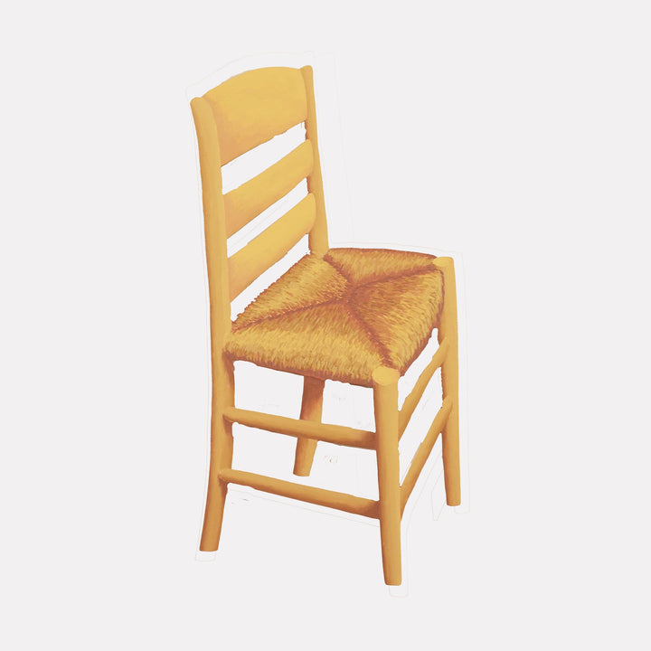 The artwork "Vincent" by Carl Chaiet in gallery position 1 presents a simplified wooden chair with a woven seat in warm honey-brown tones against a muted background. The minimalistic composition and soft color palette evoke the quiet intimacy and subtle textures found in the works of Giorgio Morandi and the gentle realism of Edward Hopper.