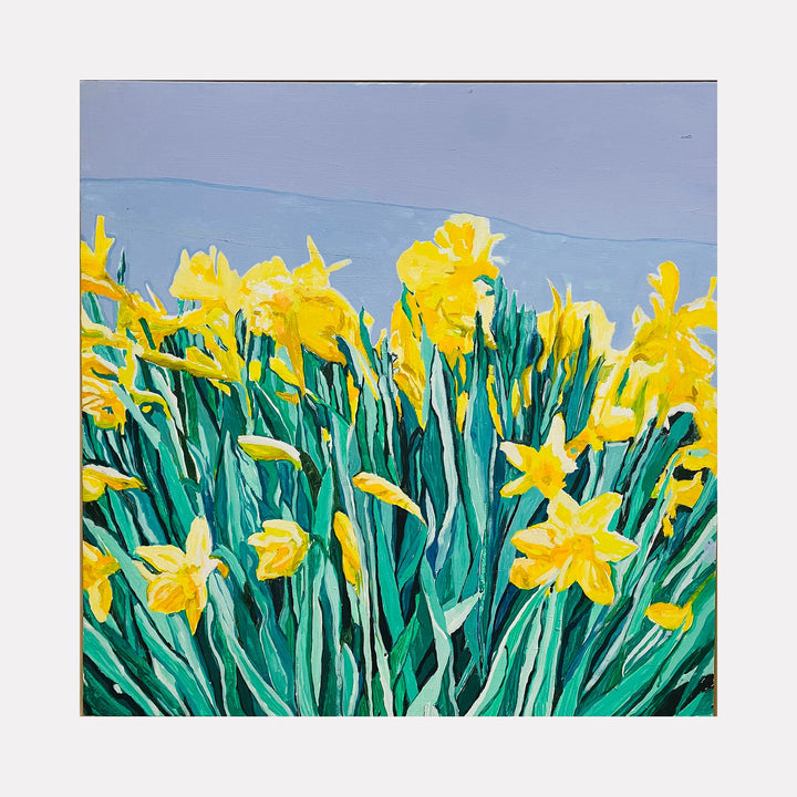 The artwork "Daffodils" by Lisa Warren features vibrant yellow daffodil flowers with rich green leaves set against a soft blue-gray background. The bold brushstrokes and vivid color contrasts evoke the lively, expressive style reminiscent of Vincent van Gogh’s floral paintings, capturing both the texture and movement of the flowers in a modern impressionistic manner.