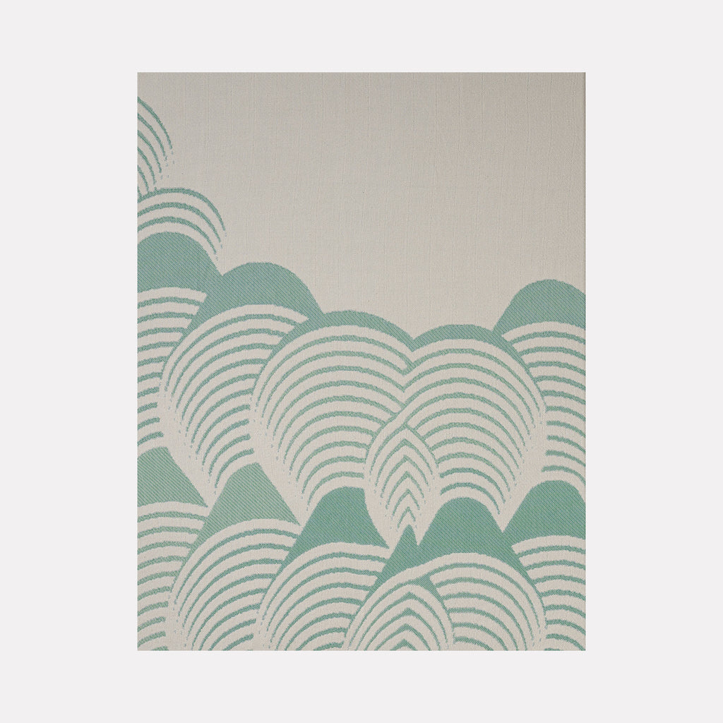 Waveform Drift (#2) by Craftwork displays a serene abstract textile pattern with layered curves in soft green and cream tones, creating a harmonious rhythm that evokes gentle waves and natural flow in a minimalist, modern art style.