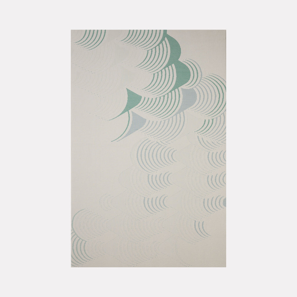 Waveform Drift (#3) by Craftwork presents a gentle abstract pattern of soft blue and green arcs on a light neutral background, evoking a sense of flowing movement and calm in a refined, modern art style.