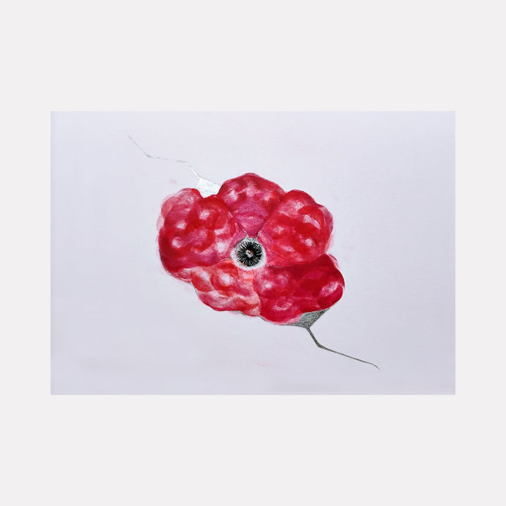 The artwork 'Windflower' by Ronit Levin Delgado features a vibrant red anemone flower painted with lipstick and chrome paint on white archival paper. The delicate petals are rendered in rich, textured crimson hues, surrounding a dark central eye, with subtle silver accents creating depth and dimension. The minimalist composition against the stark background emphasizes the flower's natural beauty.