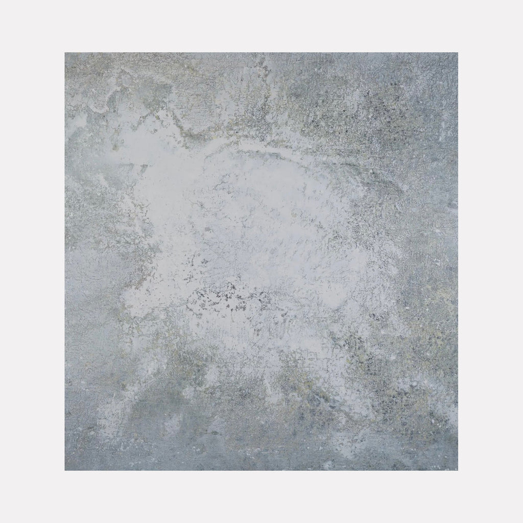 The artwork "#101" by Nathan Aufrichtig features an abstract gray landscape with textured layers evoking natural stone and weathered surfaces. The subtle interplay of light and shadow creates a serene, contemplative mood, reminiscent of the muted, atmospheric abstractions found in works by Agnes Martin and Mark Rothko.