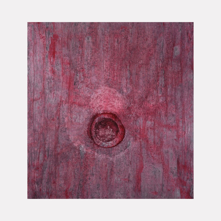 The artwork "#108" by Nathan Aufrichtig features an abstract composition dominated by deep reds and muted purples, with a textured, weathered surface. A central circular indentation creates depth and focus, evoking the tactile minimalism and raw materiality reminiscent of Mark Rothko's color field works and the subtle textural explorations of Anselm Kiefer.
