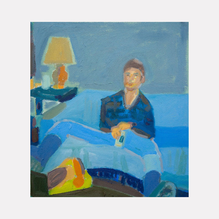 The artwork "Cool Down" depicts a person relaxing on a blue couch in a softly lit room, holding an object in their hand. The painting features broad, textured brushstrokes with a muted color palette of blues, grays, and hints of yellow and orange, creating a calm and contemplative atmosphere. By Chelsie Sunde.