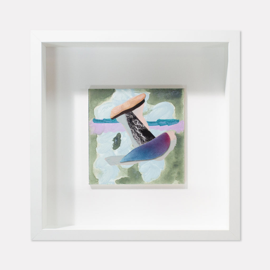 The artwork 'Fragment#01' by Winnie Sidharta features abstract collage elements combining watercolor and magazine cutouts on a 5x5 inch panel. The composition shows floating shapes in blue and peach tones against a soft green background, with white cloud-like forms creating depth and movement. The piece is displayed in a clean white frame that enhances its minimalist aesthetic.