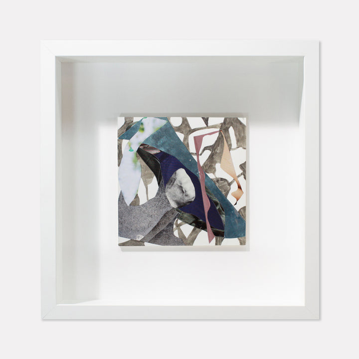 The artwork 'Fragment#03' by Winnie Sidharta features an abstract collage composition combining watercolor and magazine cutouts on a panel. Deep blue and teal tones merge with neutral grays and whites, creating dynamic angular shapes and organic forms. The piece displays a contemporary mixed-media approach with layered textures and geometric elements within a clean white frame.