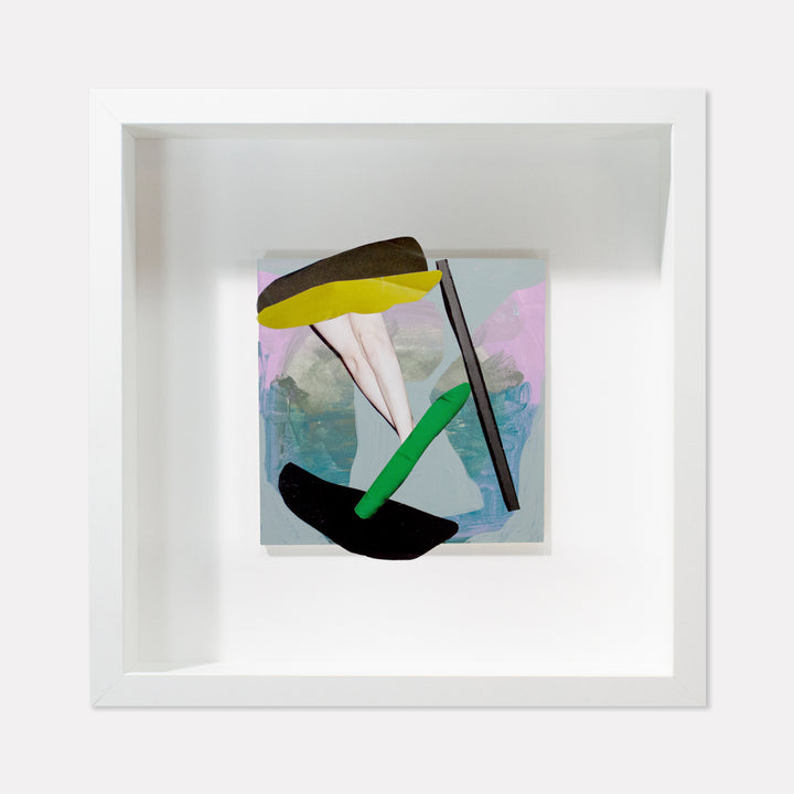 The artwork 'Fragment#05' by Winnie Sidharta features abstract geometric shapes in bold colors against a dreamy watercolor background. A yellow arc hovers above black and green angular forms, while soft pink and blue washes create a misty atmosphere. The mixed media piece combines magazine cutouts with delicate watercolor techniques on a 5x5 inch panel.