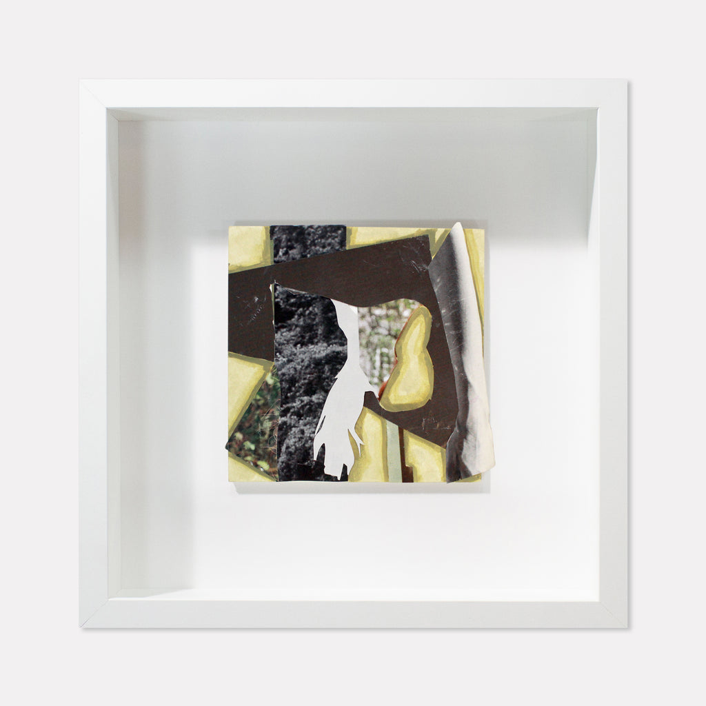 The artwork 'Fragment#06' by Winnie Sidharta features an abstract collage composition combining watercolor and magazine cutouts on a 5x5 inch panel. The piece displays contrasting textures of smooth yellows and deep blacks, with torn paper elements creating dynamic angular shapes and a striking white form against a dark background, all presented in a clean white frame.