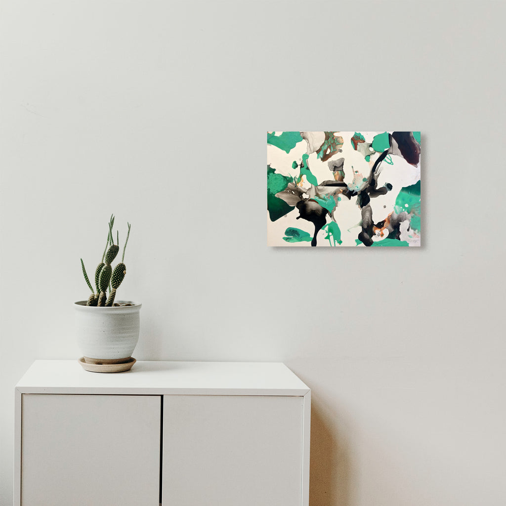 The artwork 'Scully's Torch Bleached' by Linda Lee Nicholas features dynamic abstract patterns in striking emerald green and deep black splashes against a white background. Bold brushstrokes create an organic, fluid composition with sharp contrasts and bleached effects. The acrylic on clayboard technique brings depth and texture to this contemporary abstract piece.