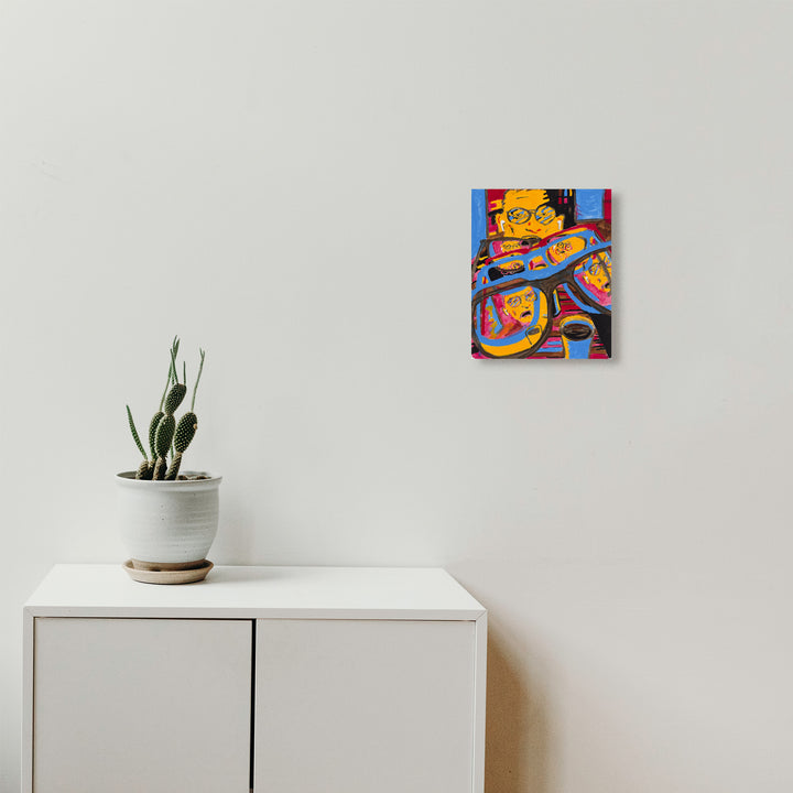 The artwork 'Person with Earbuds Talking at You' by Til Will depicts a vibrant abstract figure rendered in bold oranges, blues, and reds. The composition shows stylized forms suggesting a figure wearing earbuds and glasses slightly askew, painted with expressive acrylic brushstrokes on paper. The dynamic modern artwork measures 17x14 inches - by Til Will.