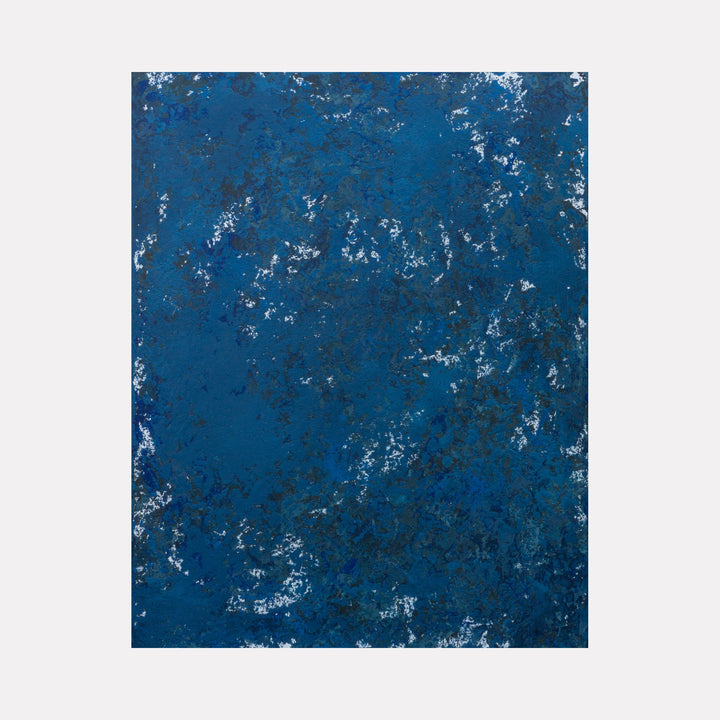 The artwork 'Sea green, see blue' by Jacqueline Ferrante features an abstract composition with deep oceanic blues and subtle sea green undertones. Textured acrylic brushstrokes on birch panel create a weathered, organic pattern reminiscent of waves and seafoam, with white speckled details throughout the 14x11 inch surface.