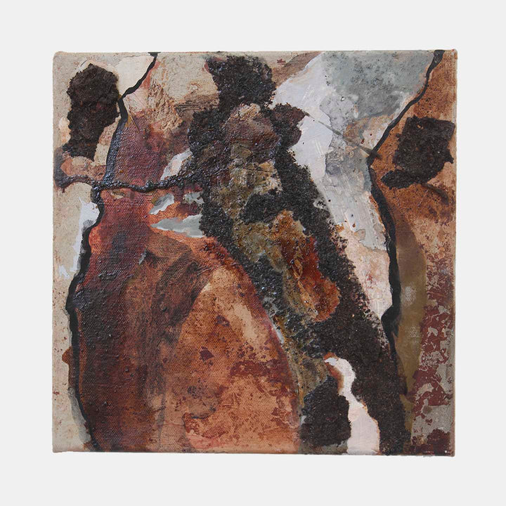 The artwork 'KÜF #10' by Sinejan Kılıç Buchina features abstract organic forms in rich earth tones. A dramatic interplay of rustic browns, deep blacks, and silvery grays creates a textural landscape reminiscent of natural erosion patterns. The mixed media on canvas showcases fluid, curved lines and weathered surfaces, suggesting geological formations or decomposed organic matter.