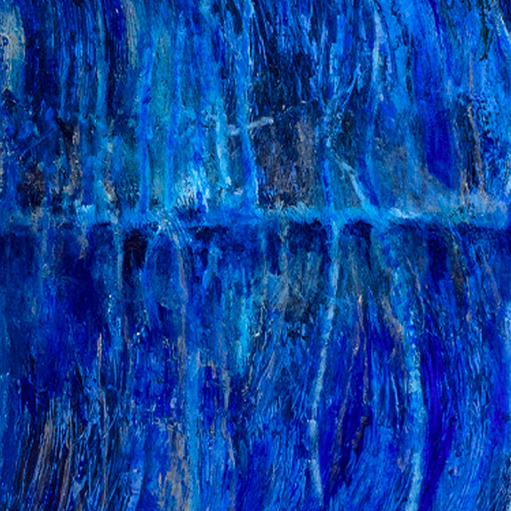 The artwork 'The Water's Edge by Moonlight' by Camilla Webster features dramatic vertical brushstrokes in deep cobalt and ultramarine blues, creating a mesmerizing reflection of moonlit water. The acrylic on canvas painting combines textured layers with dark undertones and silvery highlights, evoking the mysterious depths of nocturnal waters. 37x61 inches by Camilla Webster.