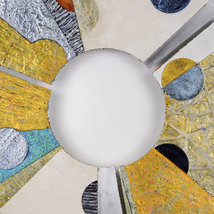 The artwork 'Convex #35' by Francie Hester features a circular composition with a central white void surrounded by radiating segments of textured aluminum. Vibrant yellow sections contrast with metallic silver, deep blue, and turquoise accents. The mixed media piece combines acrylic and cold wax techniques, creating a dynamic interplay of geometric forms and celestial-inspired elements.