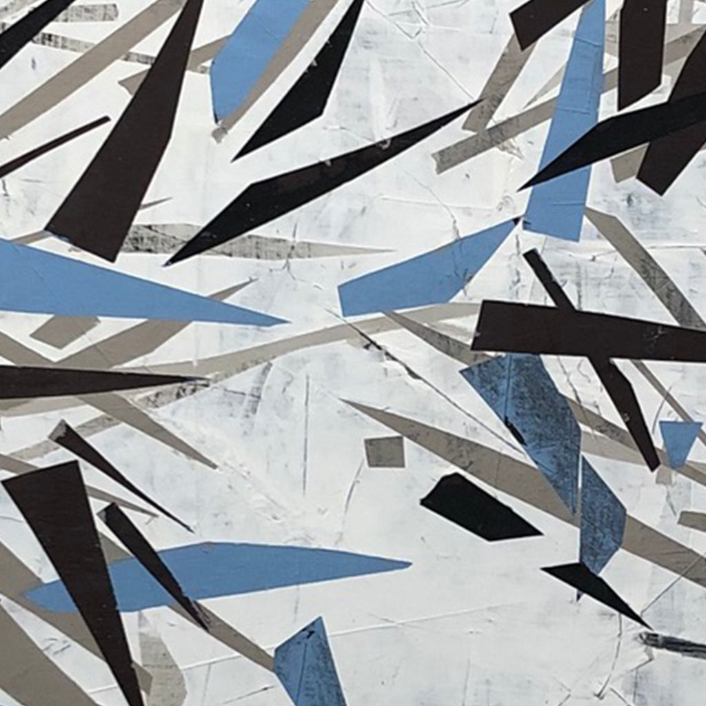 The artwork 'Icicles' by Shira Toren features dynamic angular shapes in black and powder blue scattered across a white and grey textured background. Abstract geometric forms create a sense of movement, resembling shattered ice or winter fragments. The 24x24 inch composition combines sharp edges with subtle layering, expressing a modern minimalist aesthetic.