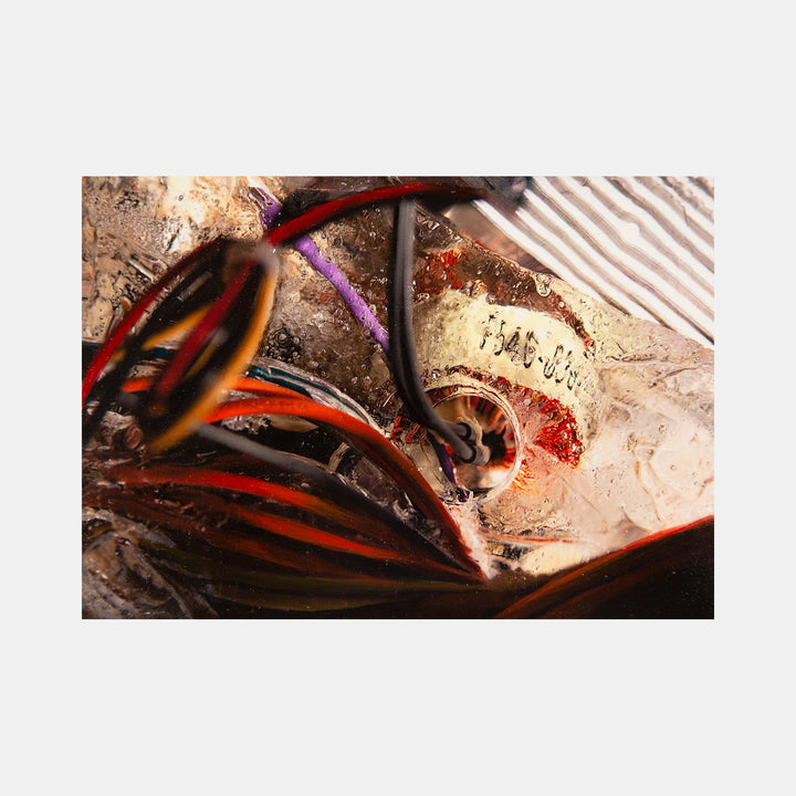 The artwork 'J-546-838' by Sarah Canfield features dynamic swirls of vibrant orange and deep red tones against a textured bronze background. Abstract curves and lines create a sense of movement, with metallic highlights adding dimensional depth. Mixed media on cradled panel creates rich, layered textures and a contemporary abstract aesthetic.