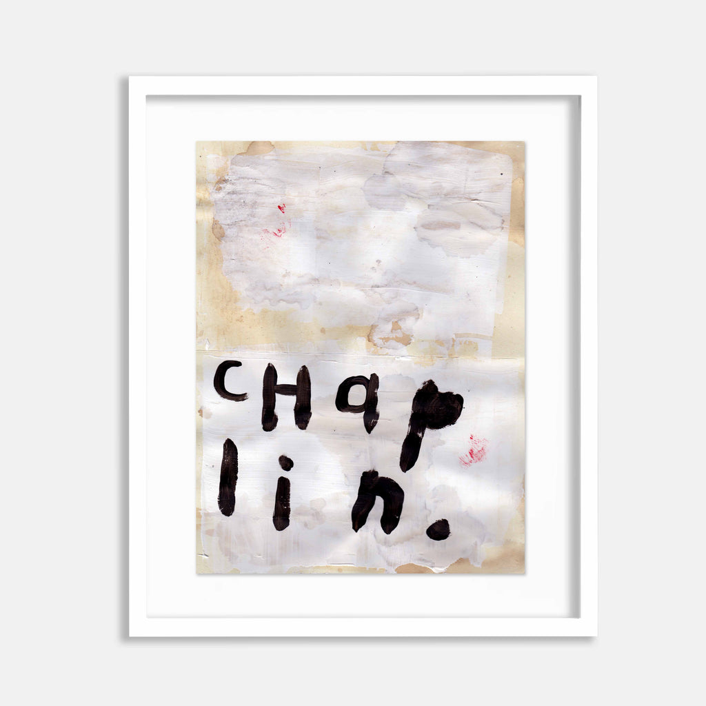 The artwork 'Chaplin' by Joseph ONeal features bold black typography on a textured, aged paper background. The letters appear hand-painted with raw, expressive strokes, creating a minimalist composition against a misty grey and cream backdrop with subtle coffee stains and mixed media elements. Art by Joseph ONeal.