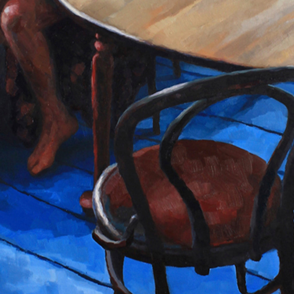 The artwork 'Chipped and Cracked' by Elody Gyekis features a dramatic composition with a black curved chair frame against a vibrant cobalt blue floor. The chair seat appears in rich burgundy tones, with strong shadows and highlights creating depth. The oil painting employs dynamic angles and bold contrasts between dark and light elements by Elody Gyekis.