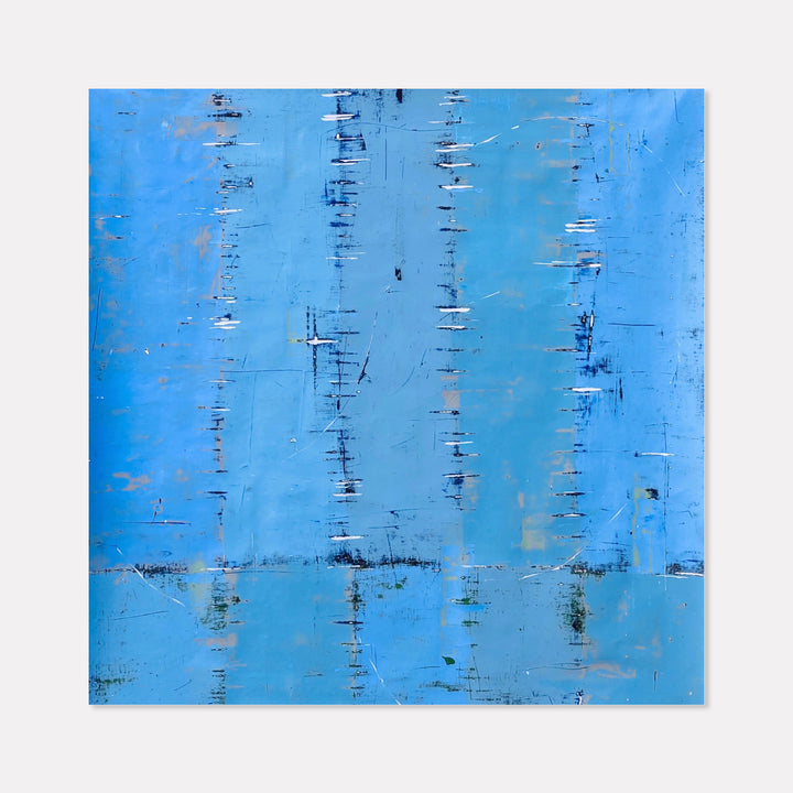 The artwork 'Chromatic Blues' by Shira Toren features a textured abstract composition in vibrant azure blue tones. Vertical linear elements create a rhythmic pattern across the canvas, while subtle variations in the Venetian plaster technique add depth and dimension. Dark accents and scratched textures punctuate the monochromatic blue surface, creating a contemplative architectural quality.