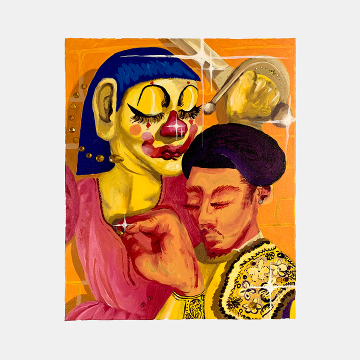 The artwork 'Clown Aided by Matador' by Juan Arango Palacios features a surreal composition with a yellow-faced figure wearing a blue hood and expressive makeup alongside a figure in traditional matador attire with gold embellishments. Set against a vibrant orange background, the acrylic painting incorporates rhinestone details, creating a dynamic interplay of textures and contemporary pop art style.