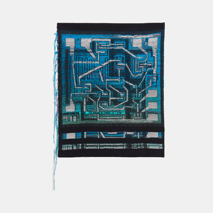 The artwork 'Crystal Currents' by Robin Kang features an intricate circuit board-inspired design woven in vibrant turquoise and metallic threads. Abstract geometric patterns and maze-like pathways create a technological landscape, rendered in hand jacquard cotton with holographic and metallic yarns. The composition combines digital aesthetics with traditional textile techniques, set against a dark background.