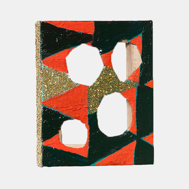 The artwork 'Cut-out-back' by Gyan Shrosbree features bold geometric patterns with white circular cutouts against a dramatic black and red abstract background. Gold glitter accents create sparkling triangular sections, combining acrylic and oil paint textures on an 8x10 inch canvas. The composition balances negative space with vibrant color blocking.