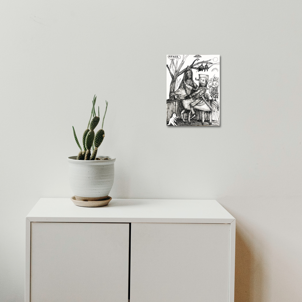 The artwork 'Dark Knight' by Andrew Chan features a black and white ink illustration against a crisp white background, showcasing figures in medieval style composition. The intricate watercolor and ink technique creates dynamic contrast and flowing lines. The piece measures 12x9 inches and is displayed above a minimalist white cabinet with a potted cactus plant.