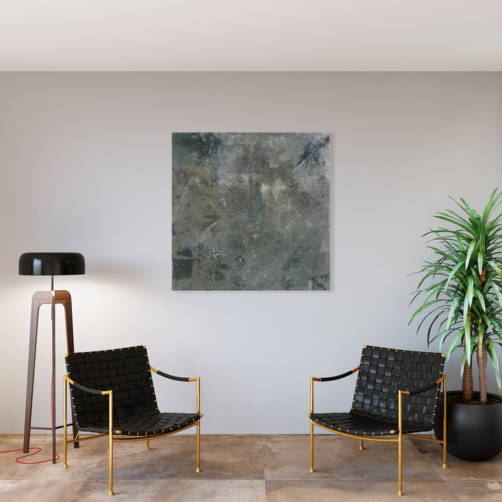 The artwork 'Face Number Five' by Barbara Groh features a modern abstract composition in muted grays and blues on a 48x48 inch oil canvas. The textured surface displays weathered, industrial-like patinas with subtle tonal variations, creating a contemplative minimalist aesthetic that evokes concrete or weathered metal surfaces.
