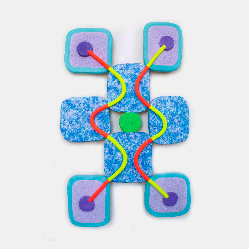 The artwork 'Finding the Green Center' by Ryan Patrick Martin features a symmetrical abstract sculpture with turquoise-bordered lavender squares connected by intertwining red and yellow curved lines on a textured blue background. A small green square sits at the center, with purple circular accents at each corner, crafted from wood and epoxy clay with acrylic paint details.