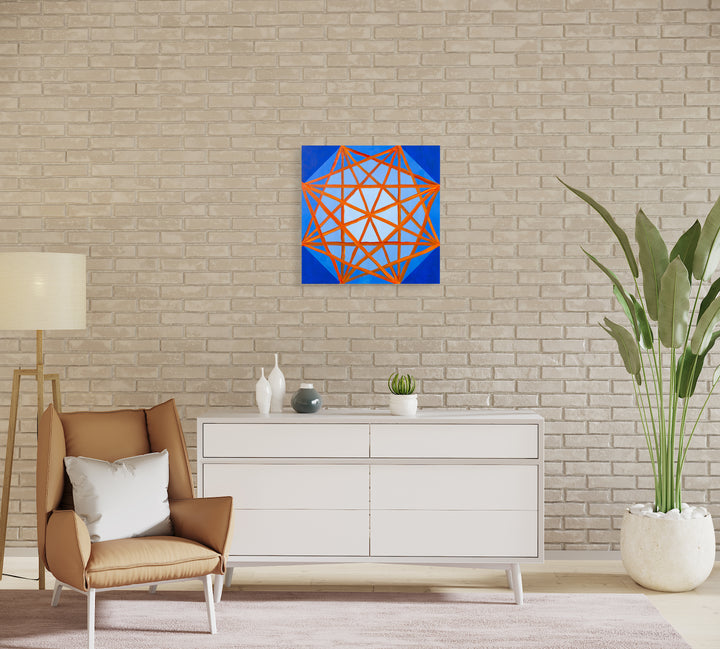 The artwork 'Fireland' by Amber Heaton features a striking geometric pattern with vibrant orange interconnected triangular lines forming a complex symmetrical web against an electric blue background. The modern abstract composition creates a dynamic starburst effect on a 24x24 inch acrylic panel, suggesting both technological precision and organic movement. By Amber Heaton.