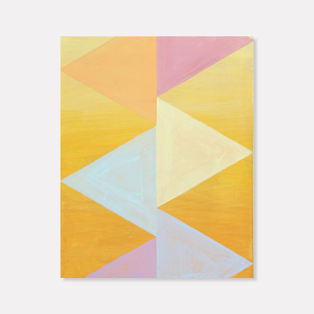 The artwork 'Flag Me' by Amber Heaton features geometric triangular shapes in pastel and warm colors. The composition includes soft yellow, peach, pink, and pale blue segments arranged in an abstract pattern on wood, painted with acrylic. The triangles create a dynamic, modern design with subtle color transitions across the 15x12 inch surface by Amber Heaton