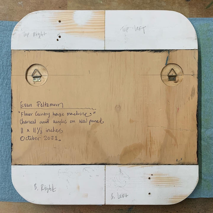 The artwork 'Flavor country haze machine' by Evan Peltzman: Wooden panel showing artwork label and mounting hardware, featuring rounded corners with white borders and tan center. Two circular mounting brackets visible. Label displays artwork details including dimensions and medium in handwritten text. Artwork by Evan Peltzman.